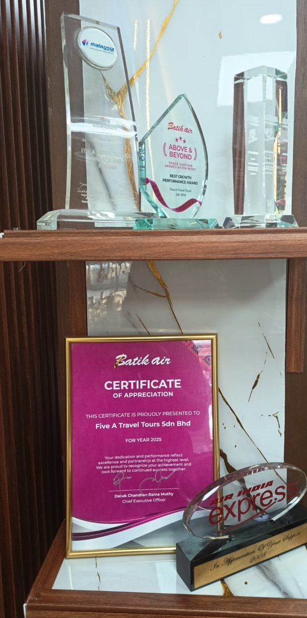 Awards from Malaysia Airlines, Batik Air and Air India Express on our office shelf